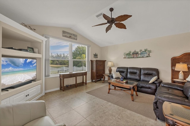 living room featuring light tile patterned flooring, lofted ceiling, and ceiling fan