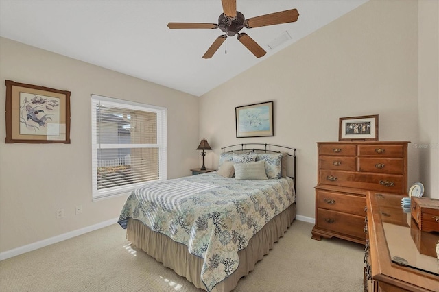 carpeted bedroom featuring vaulted ceiling and ceiling fan