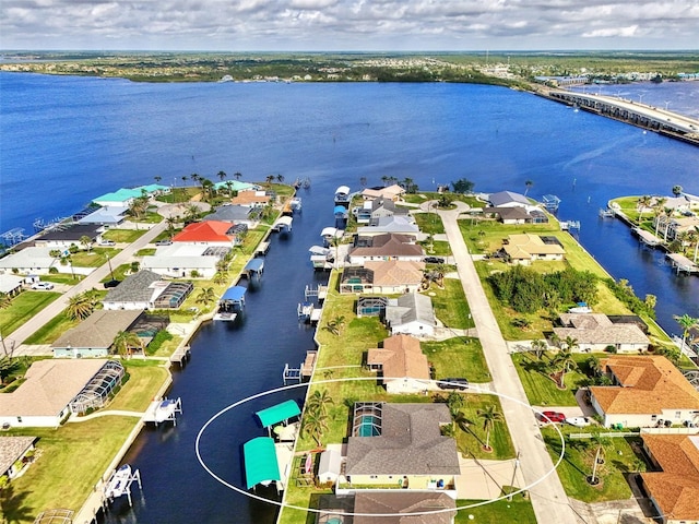 bird's eye view with a water view