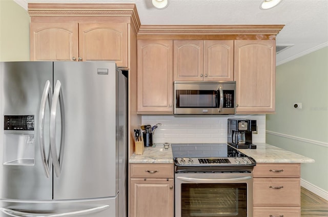 kitchen with light brown cabinets, stainless steel appliances, baseboards, ornamental molding, and backsplash