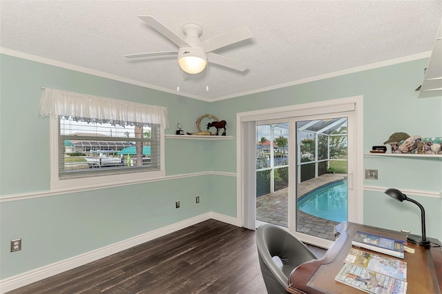 office space with dark wood-type flooring, ceiling fan, crown molding, and a textured ceiling