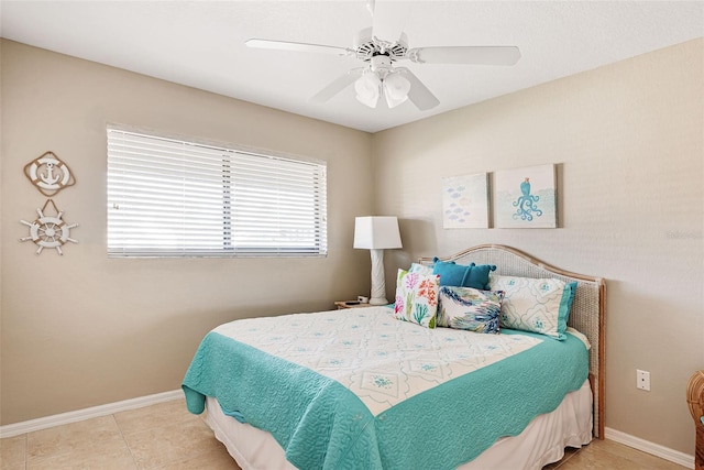 bedroom featuring ceiling fan and light tile patterned floors