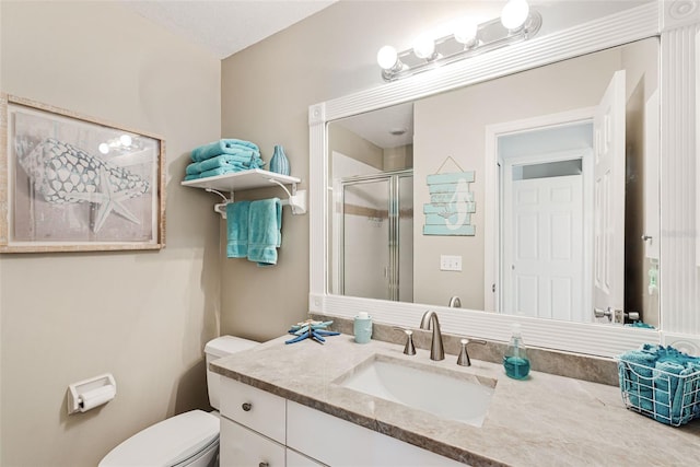 bathroom featuring walk in shower, vanity, and toilet