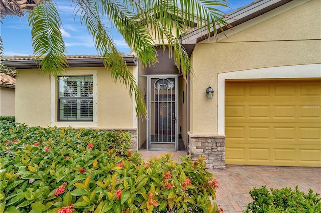 property entrance with a garage