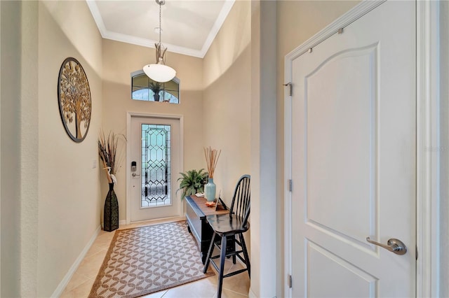 tiled entryway with ornamental molding