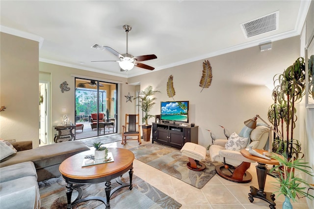 tiled living room featuring ornamental molding and ceiling fan