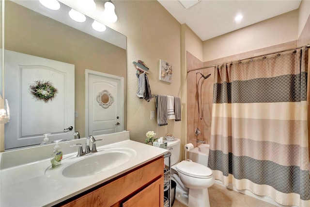 full bathroom featuring shower / tub combo with curtain, vanity, toilet, and tile patterned floors