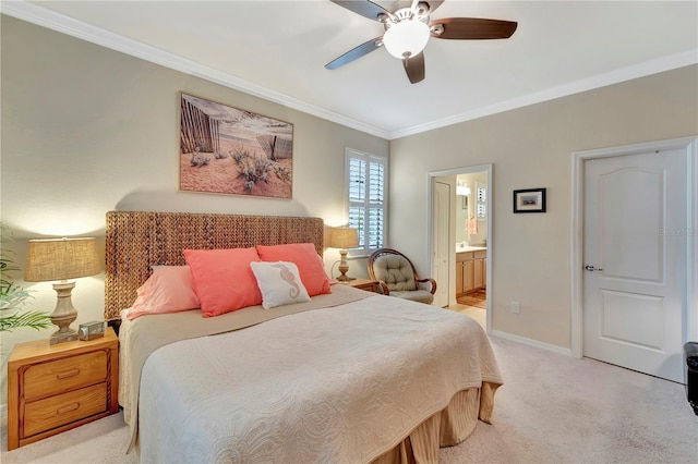 bedroom featuring ensuite bathroom, ornamental molding, light carpet, and ceiling fan