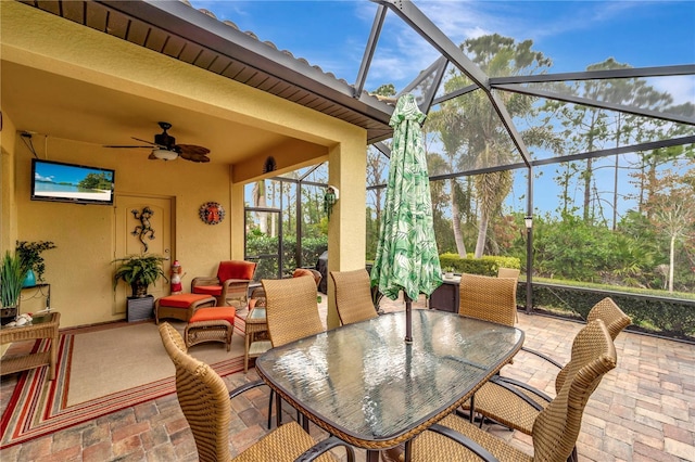 sunroom / solarium with ceiling fan