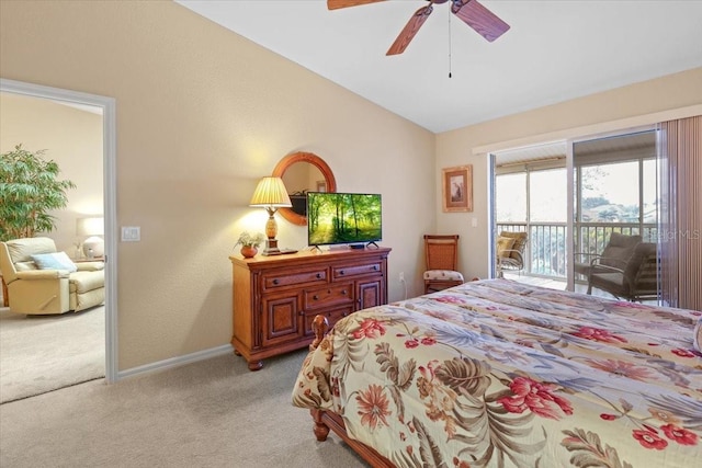 bedroom featuring ceiling fan, access to exterior, lofted ceiling, and light colored carpet