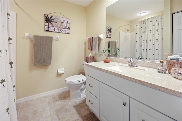 bathroom with toilet, tile patterned flooring, walk in shower, and vanity