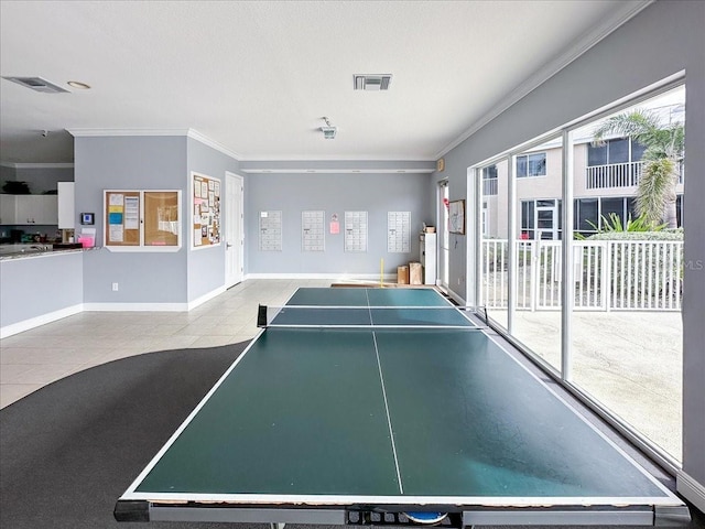 game room with light tile patterned floors and ornamental molding