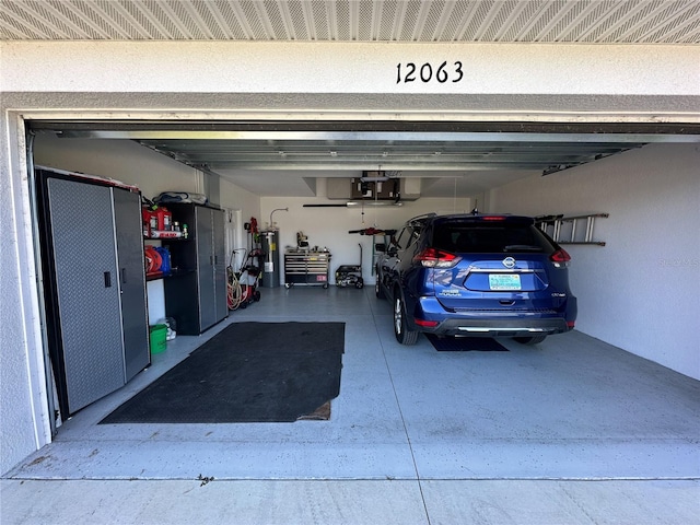 garage featuring water heater