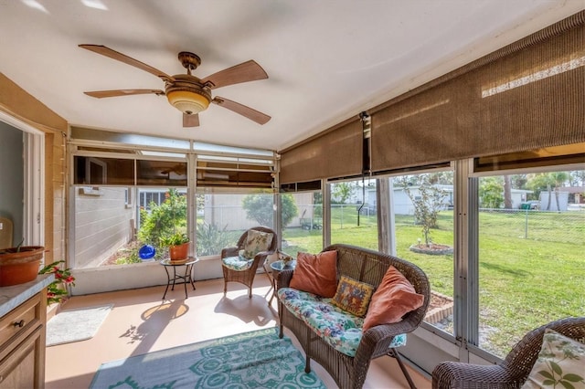 sunroom / solarium with ceiling fan