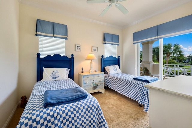 bedroom with carpet floors, ceiling fan, and ornamental molding