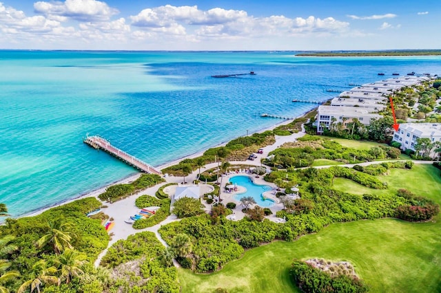 bird's eye view with a water view and a view of the beach