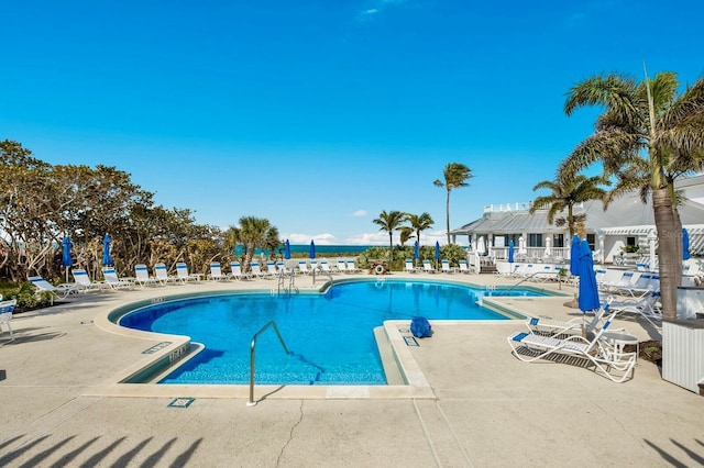 view of pool featuring a patio and a pergola