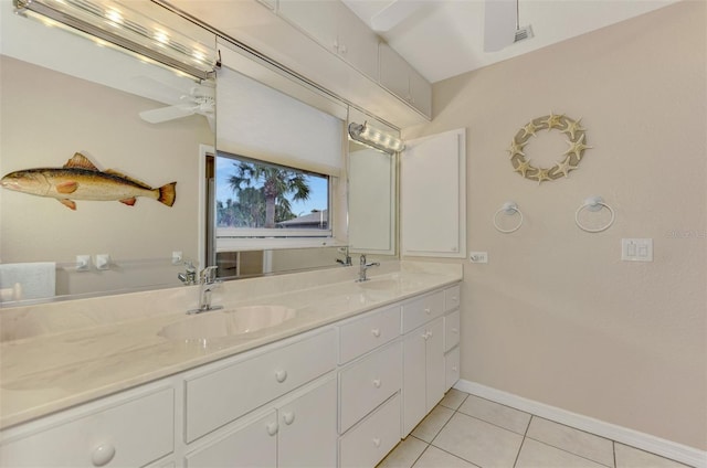 bathroom with tile patterned floors and vanity