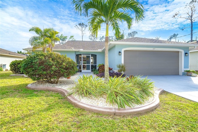 single story home featuring a front yard and a garage