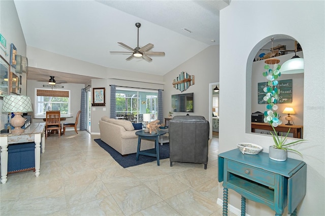 living room featuring vaulted ceiling