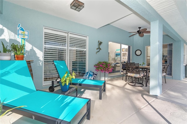 view of patio / terrace featuring ceiling fan