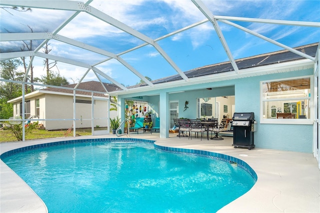 view of pool featuring a lanai, ceiling fan, a grill, and a patio