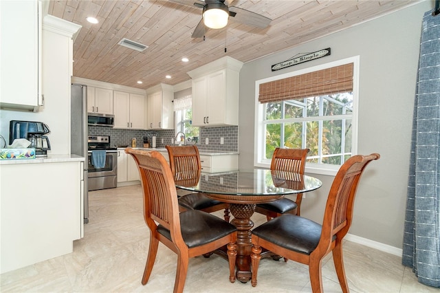 dining room with wooden ceiling and ceiling fan