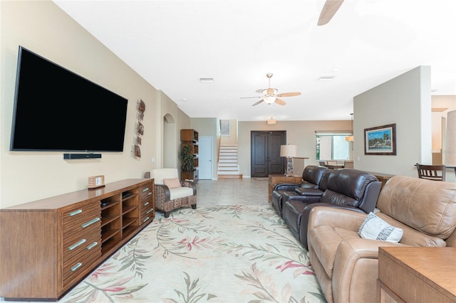 living room featuring ceiling fan