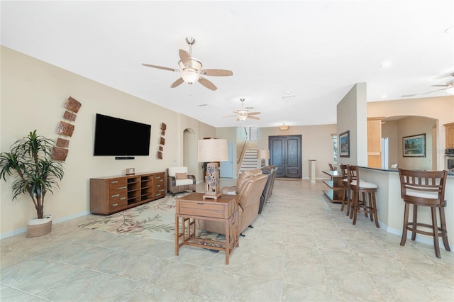 living room with ceiling fan