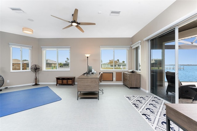 workout room with ceiling fan