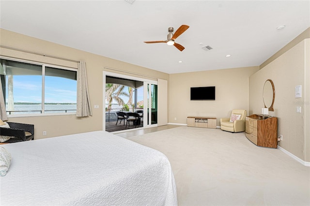 bedroom with ceiling fan and access to exterior