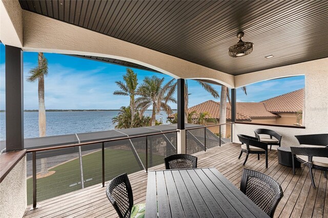 deck featuring a water view