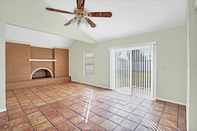 unfurnished living room featuring a fireplace, tile patterned flooring, ceiling fan, and vaulted ceiling