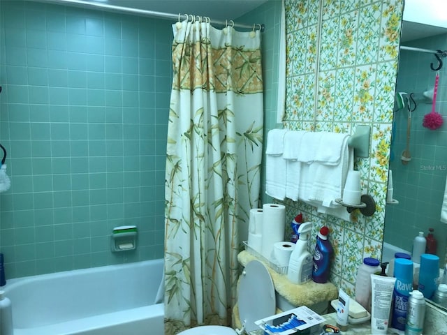 bathroom with toilet and shower / bathtub combination with curtain