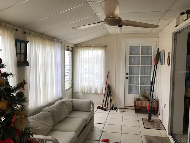 sunroom / solarium featuring ceiling fan and lofted ceiling