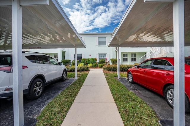 exterior space with a carport