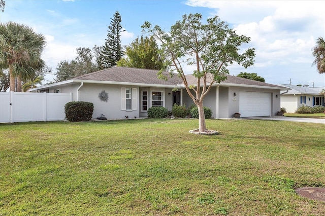 ranch-style home featuring a front lawn, an attached garage, fence, and stucco siding