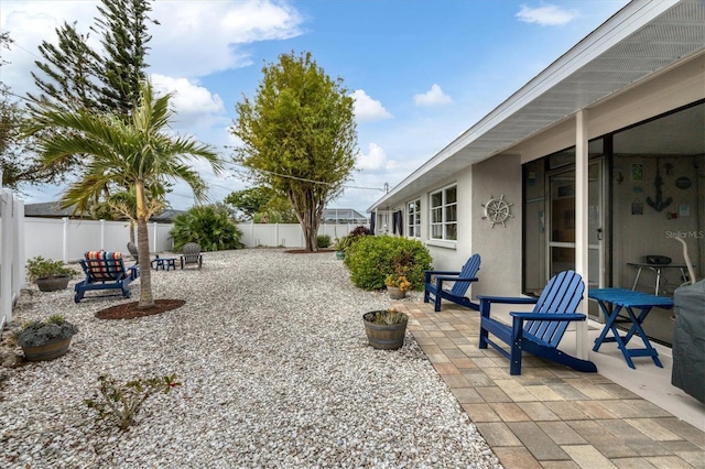 view of yard with a patio area