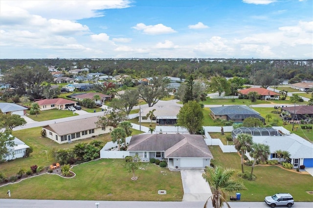 birds eye view of property with a residential view