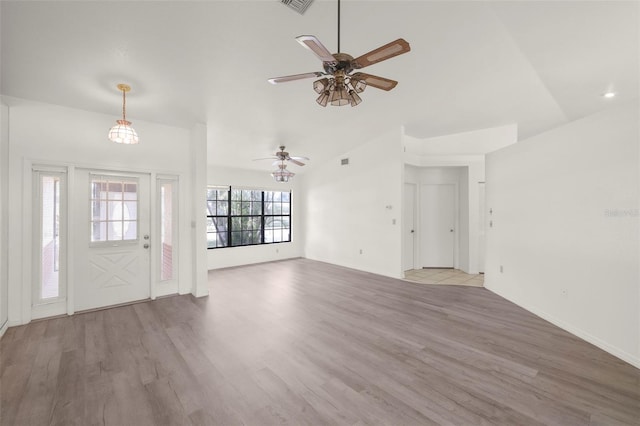 foyer entrance with light hardwood / wood-style floors and ceiling fan