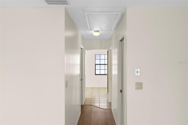 corridor with light wood-type flooring