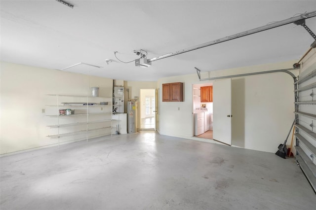 garage with heating unit, a garage door opener, washer / dryer, and water heater