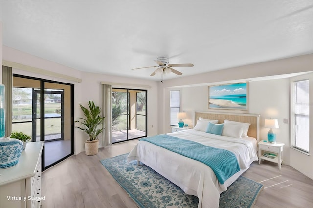 bedroom featuring multiple windows, ceiling fan, access to outside, and light hardwood / wood-style floors