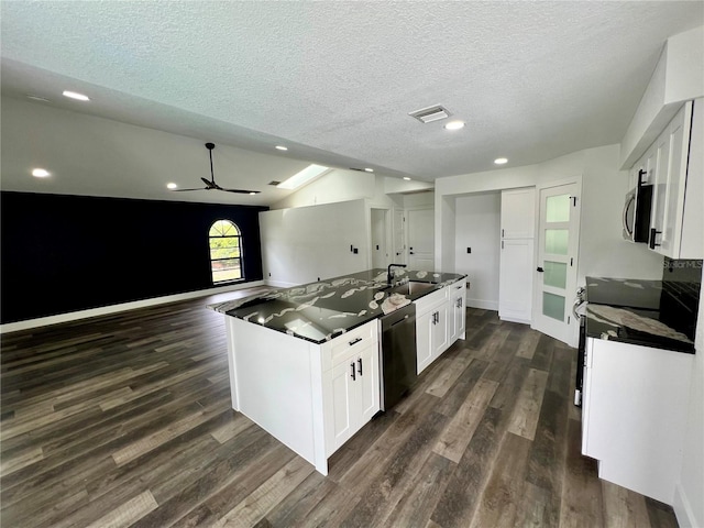 kitchen with white cabinetry, a textured ceiling, dark hardwood / wood-style floors, and dishwasher