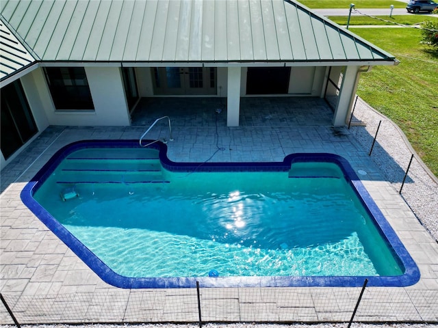 view of pool with a patio area