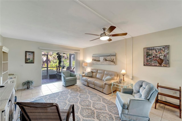 tiled living room with ceiling fan