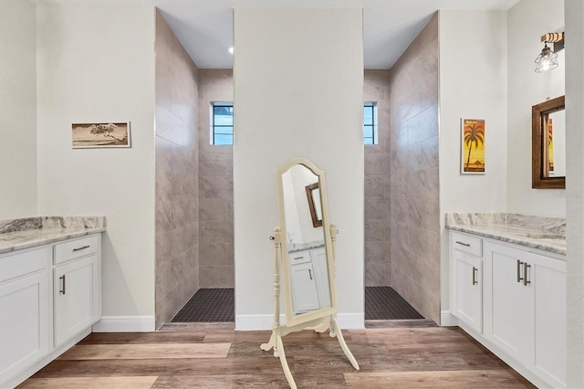 bathroom featuring hardwood / wood-style floors and vanity