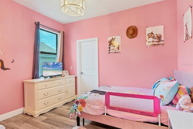 bedroom featuring light wood-type flooring