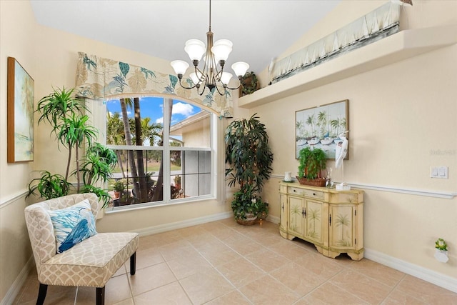 living area with an inviting chandelier, light tile patterned floors, and lofted ceiling