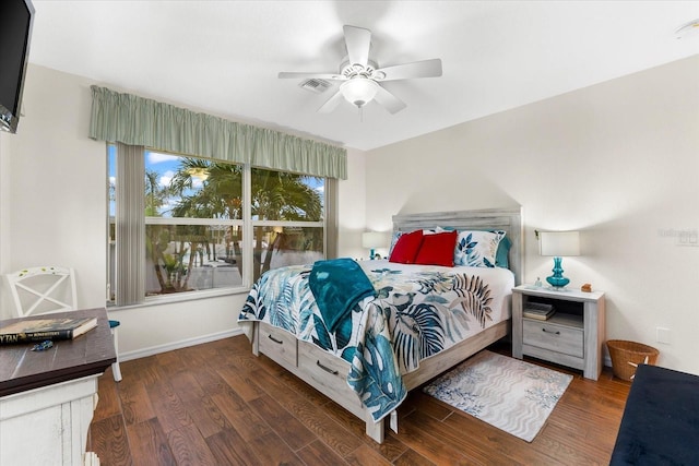 bedroom featuring ceiling fan and dark hardwood / wood-style floors